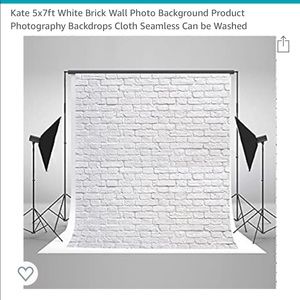 White brick photography backdrop and clamps